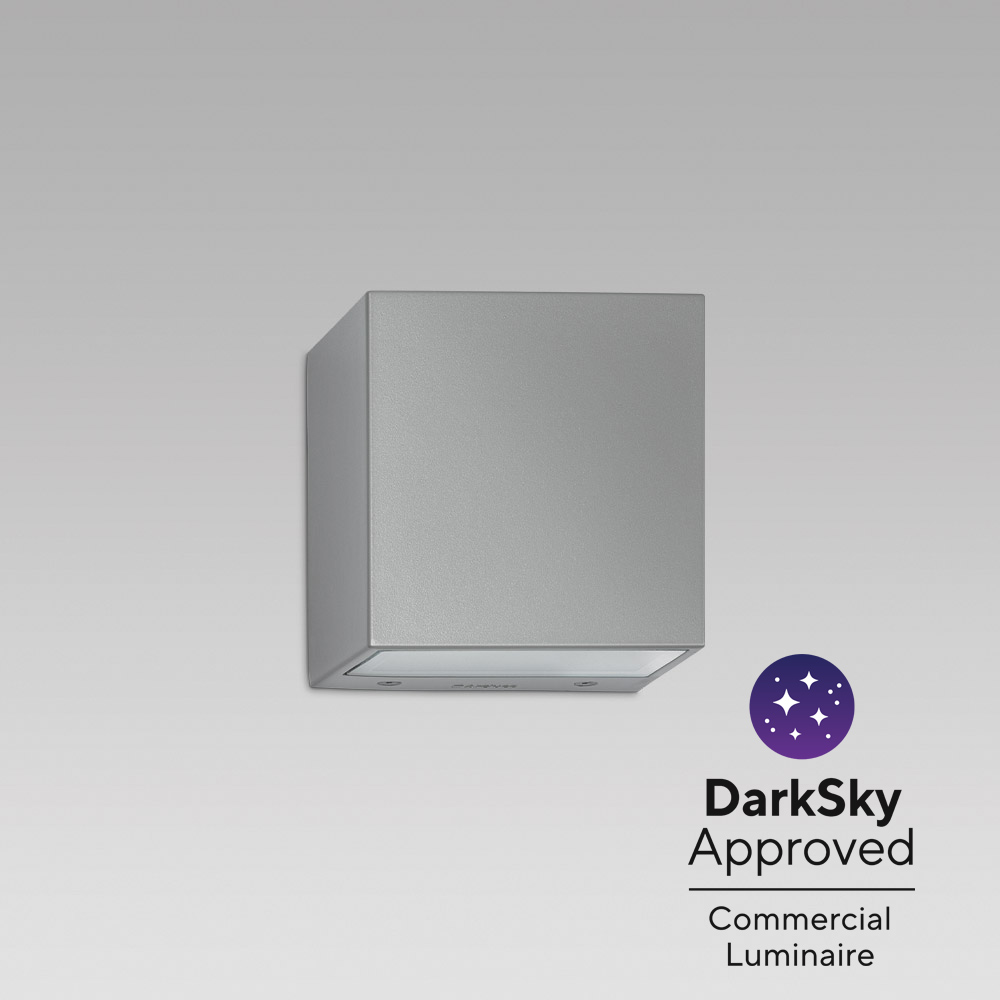 Luminaire for facade lighting with bidirectional optic, featuring an elegant elliptic design